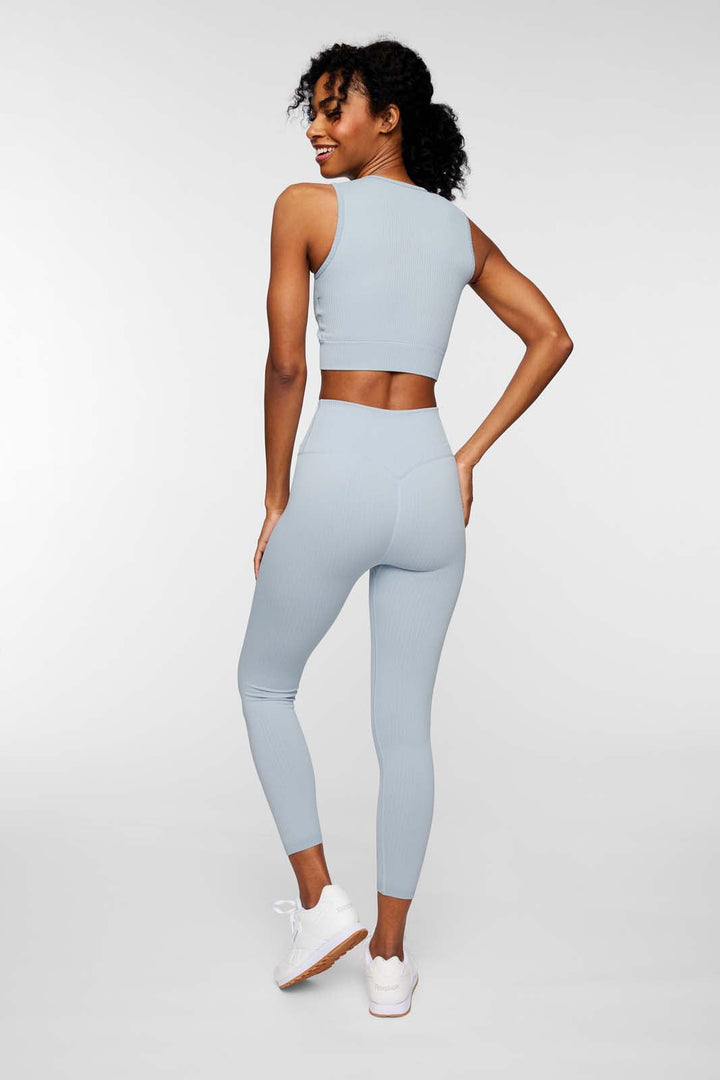 girl wearing longline sports bra and leggings